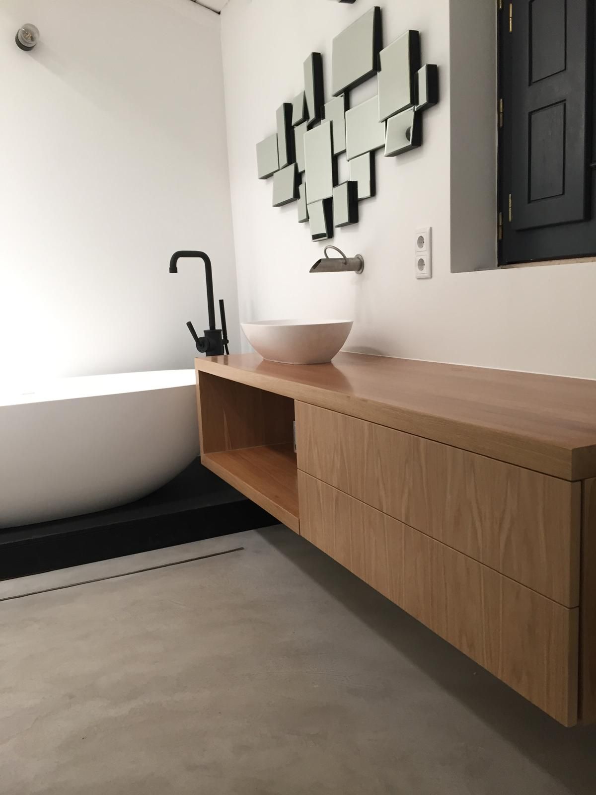 Microcement bathroom with oak vanity by KCBerry